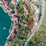 Land and house for sale in Perast